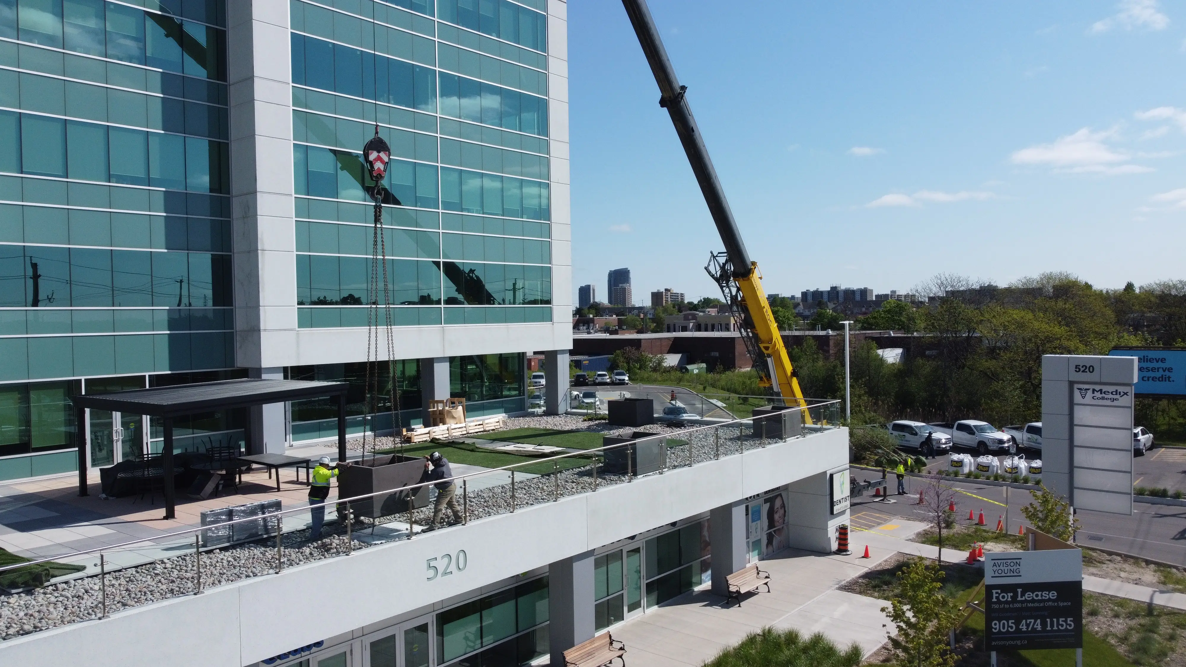 Mr. Lawnmower conducting Commercial Landscaping for a Plaza using Industrial Equipment